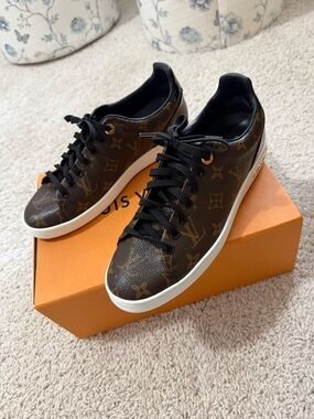 Louis Vuitton womens Monogram Low-Top Sneakers in Brown and Black